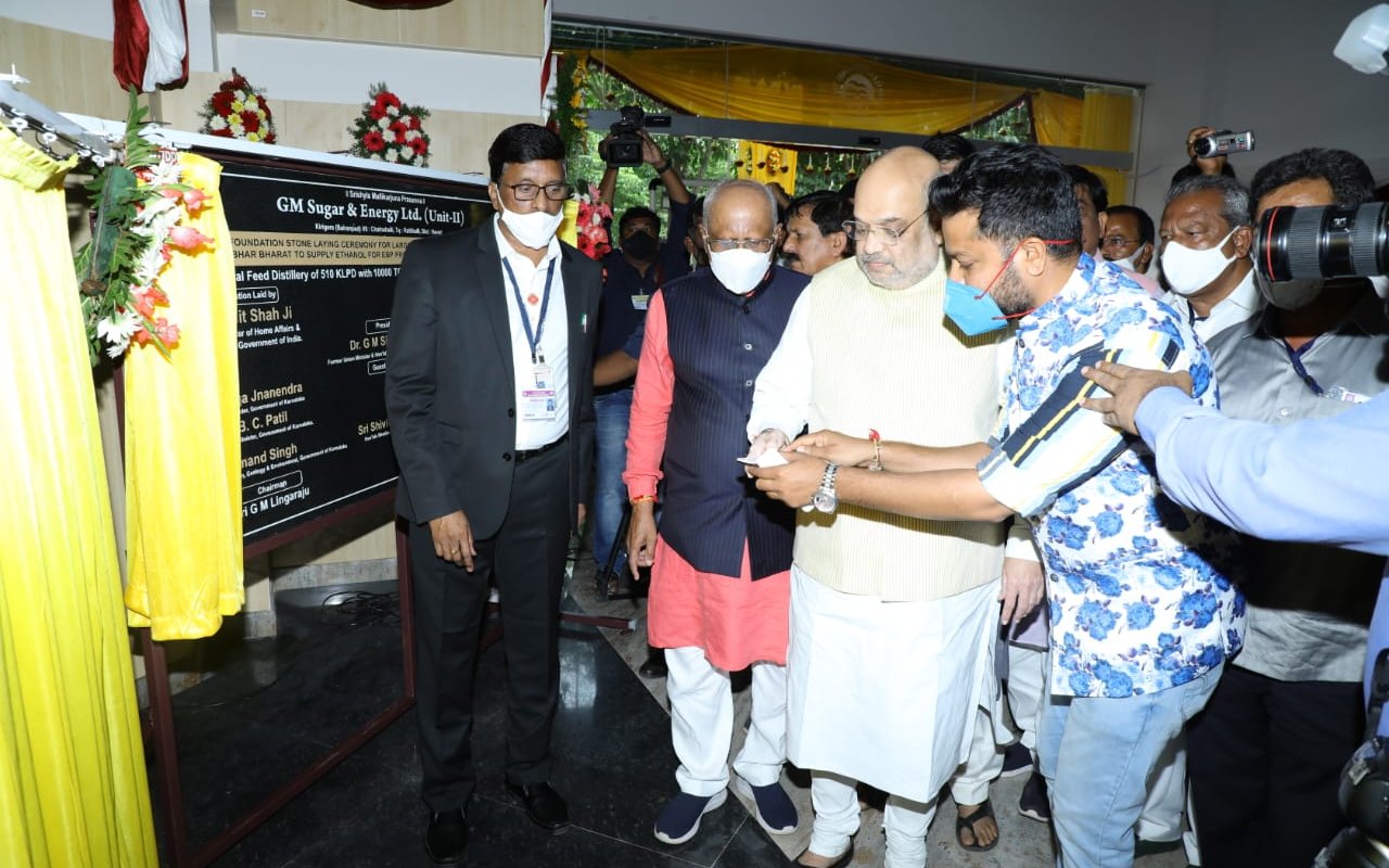 Ramesh Kumar Sambhaji S beside Union Home Minister Amit Shah at the GM Sugar & Energy Ltd Unit-II foundation stone ceremony, in front of the motorised curtain we supplied